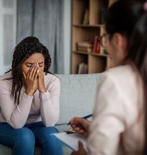 Therapist helping client